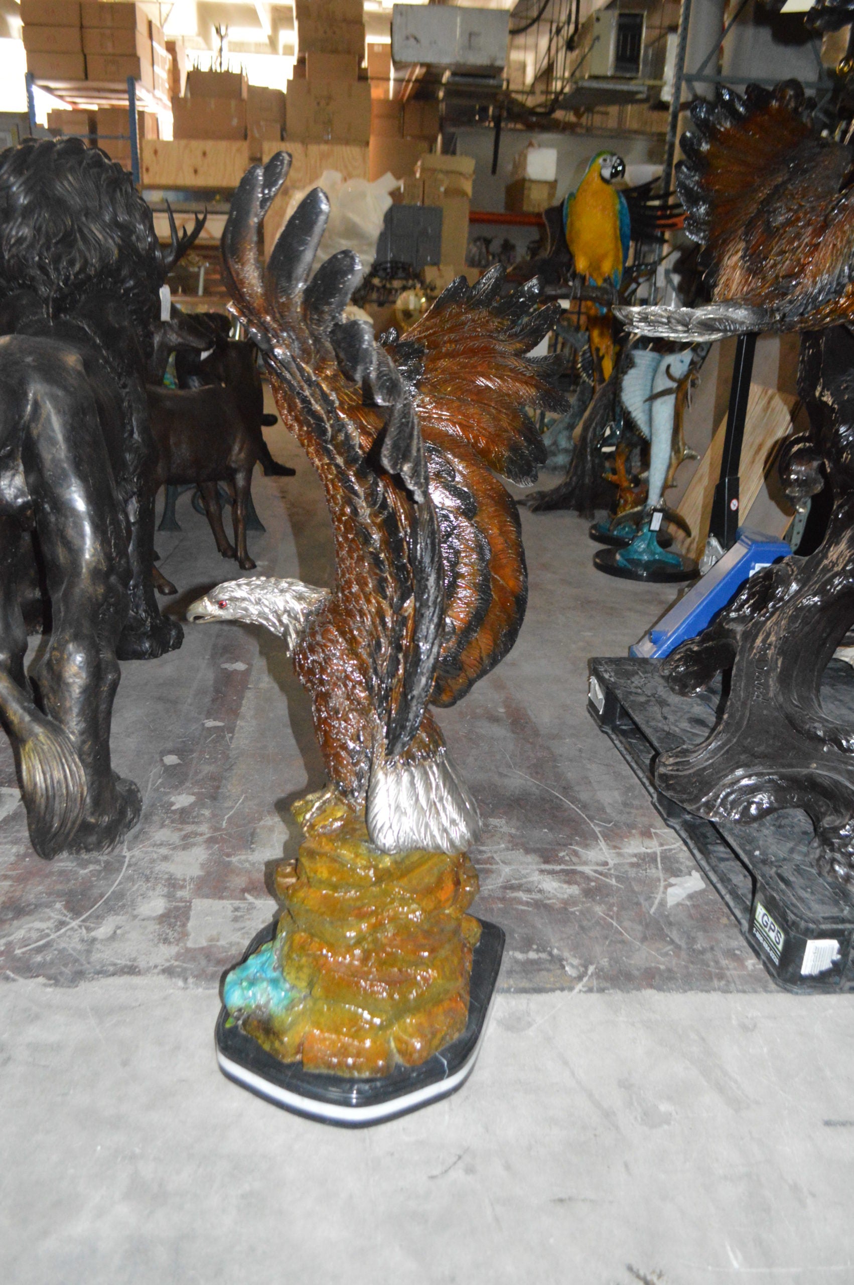 Eagle On A Rock Bronze Statue -  Size: 32"L x 18"W x 48"H. 