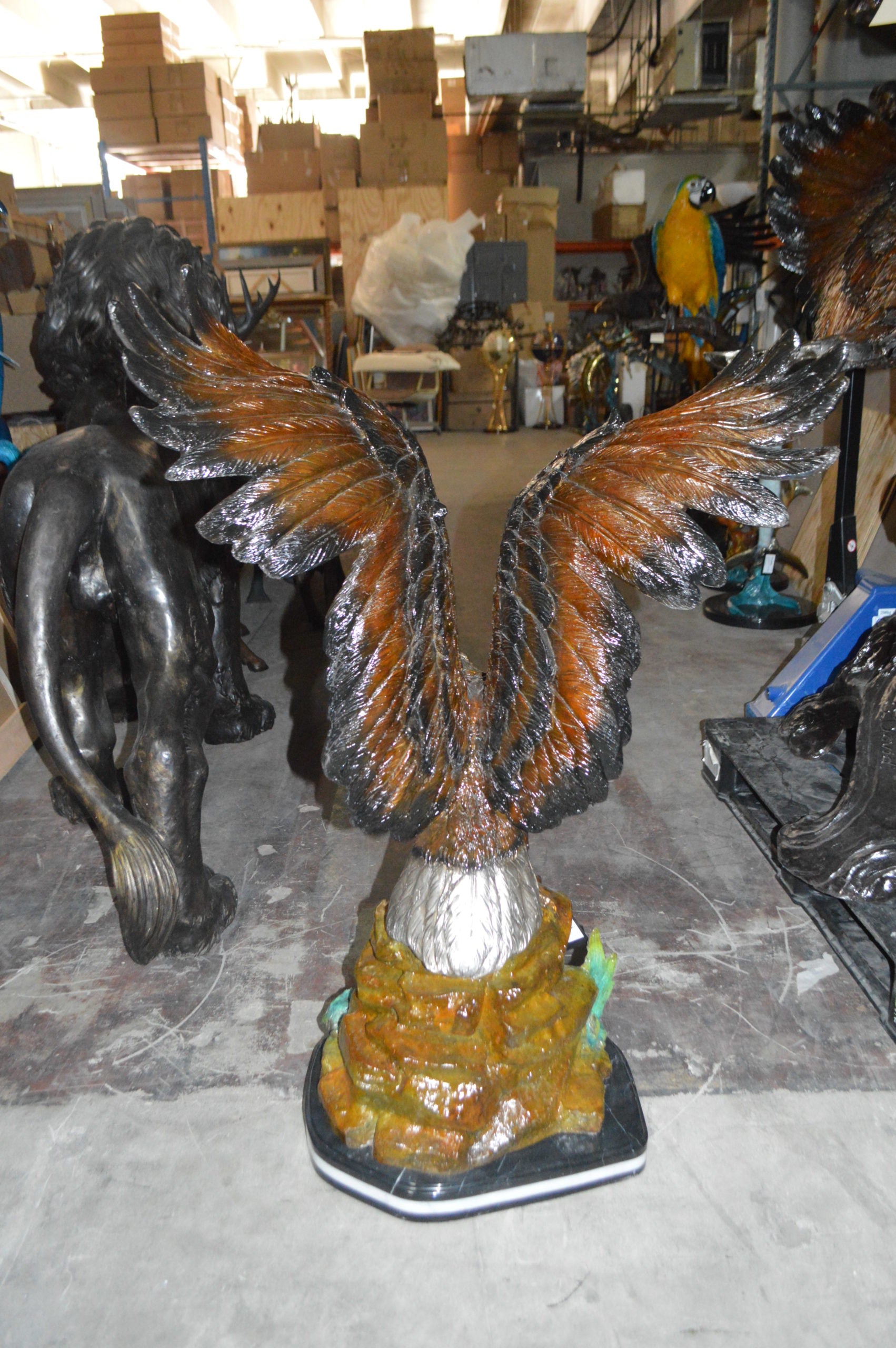 Eagle On A Rock Bronze Statue -  Size: 32"L x 18"W x 48"H. 