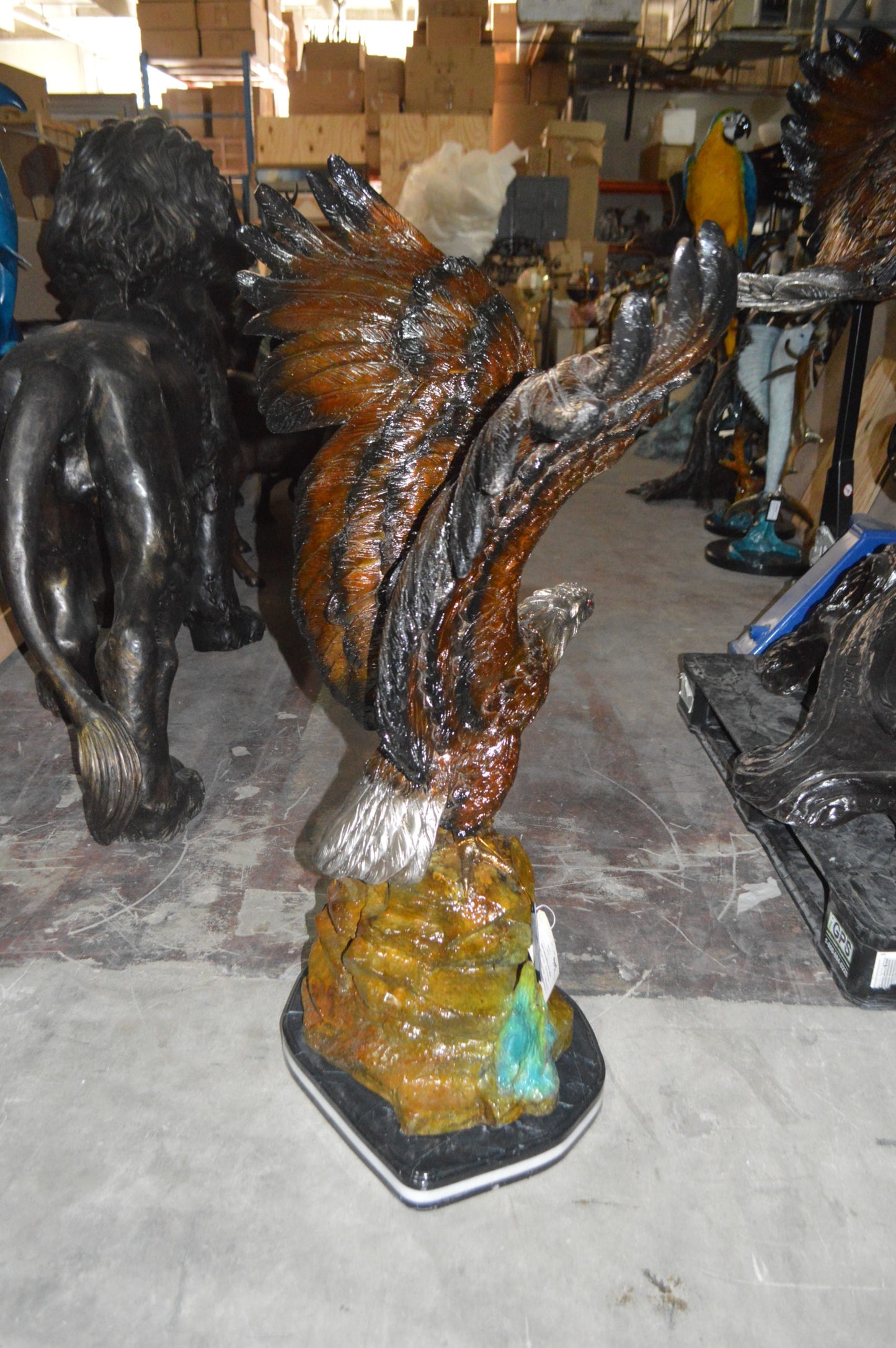 Eagle On A Rock Bronze Statue -  Size: 32"L x 18"W x 48"H. 