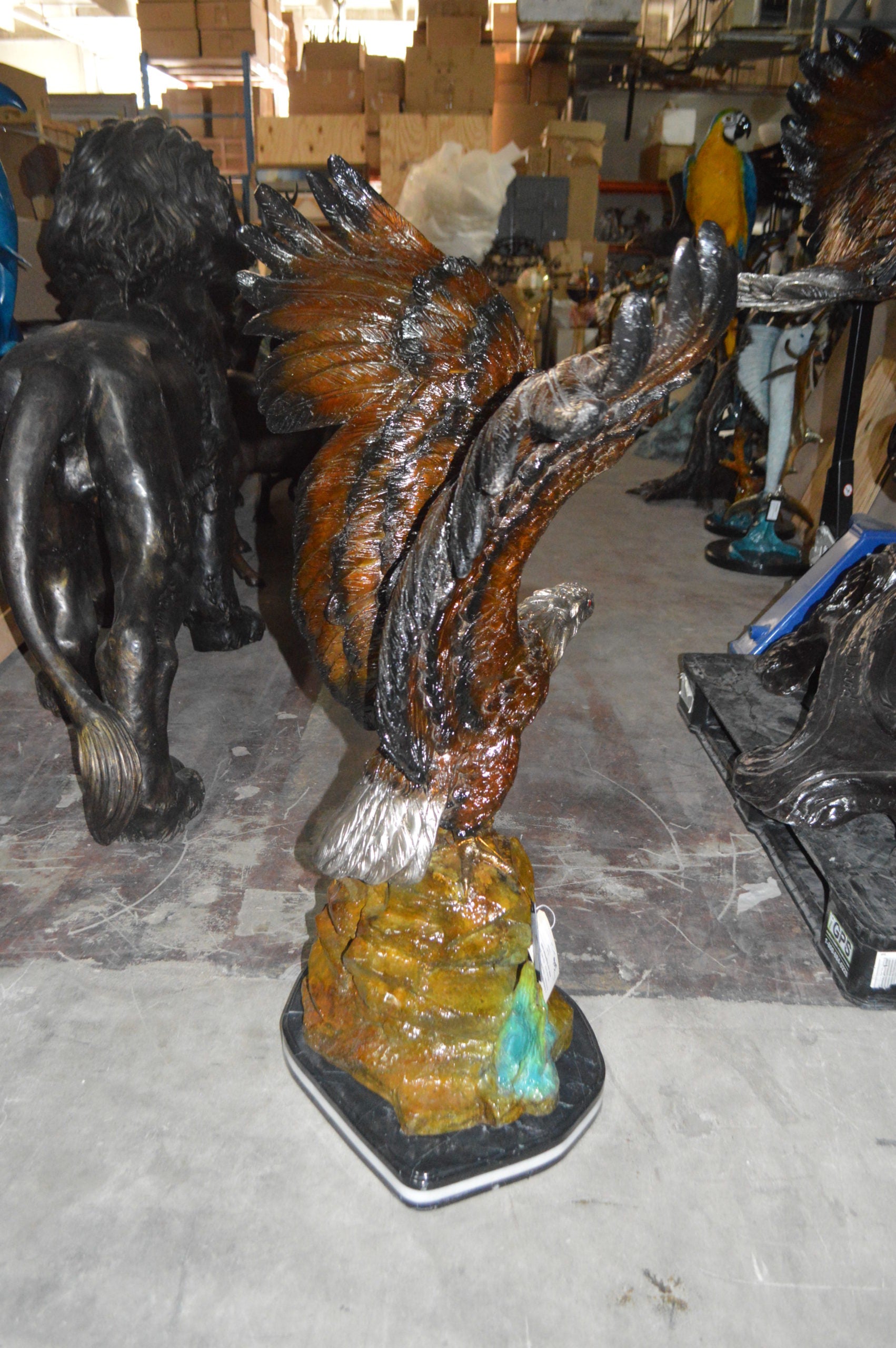 Eagle On A Rock Bronze Statue -  Size: 32"L x 18"W x 48"H. 
