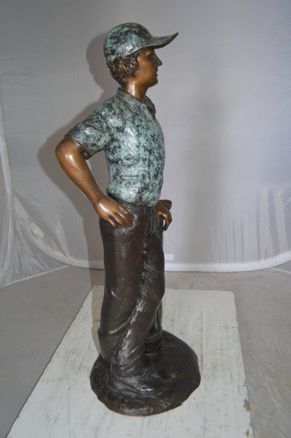 Golfer with bag Bronze Statue -  Size: 12"L x 13"W x 32"H. 