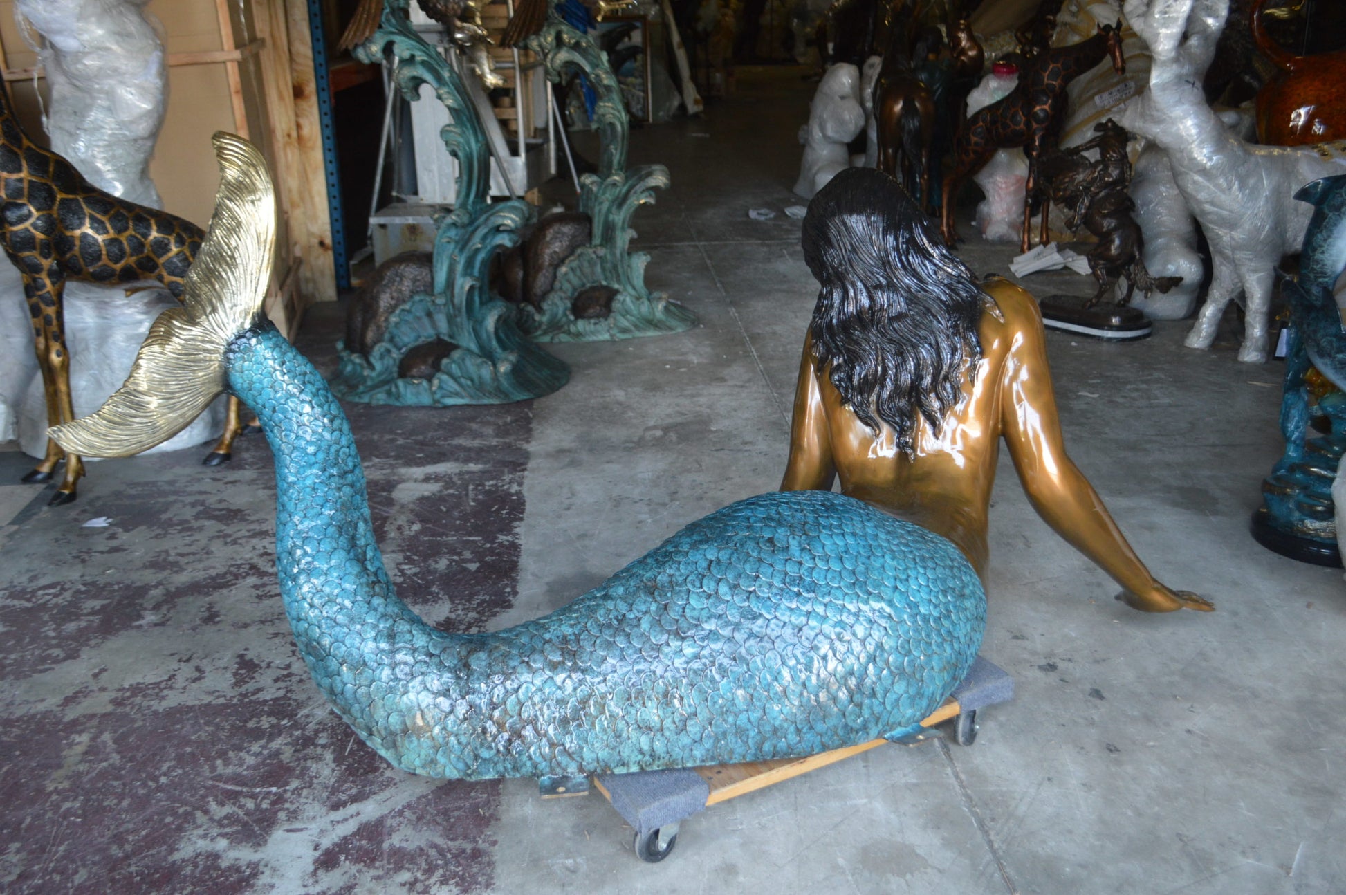 Mermaid Lying in the Sun Bronze Statue -  Size: 87"L x 44"W x 36"H. 