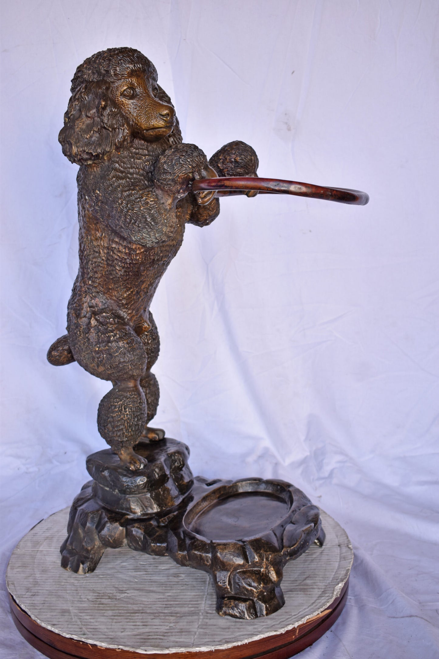 Standard Poodle Dog Hooding A Ring Bronze Statue - Size: 18"L x 13"W x 34"H.