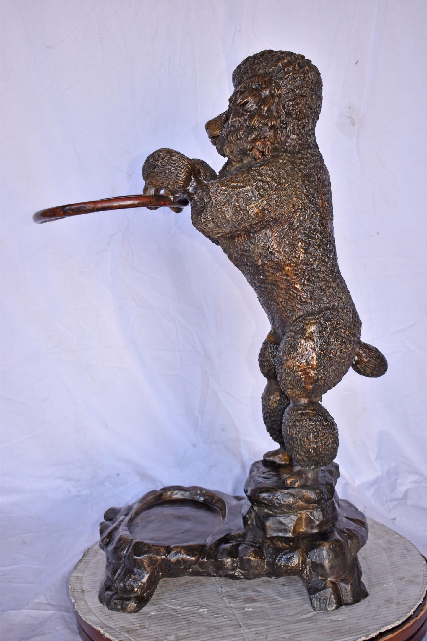 Standard Poodle Dog Hooding A Ring Bronze Statue - Size: 18"L x 13"W x 34"H.