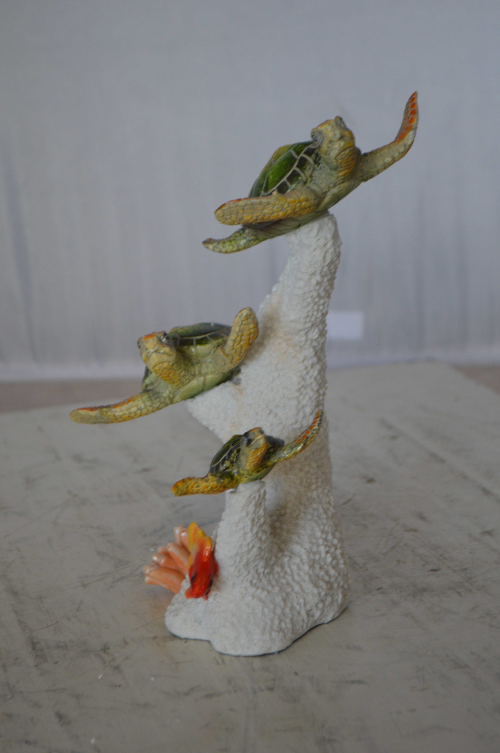 Three Turtles Swimming Resin Statue -  Size: 8"L x 8"W x 10"H. 