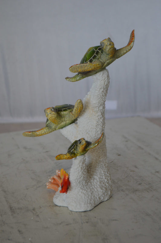 Three Turtles Swimming Resin Statue -  Size: 8"L x 8"W x 10"H. 