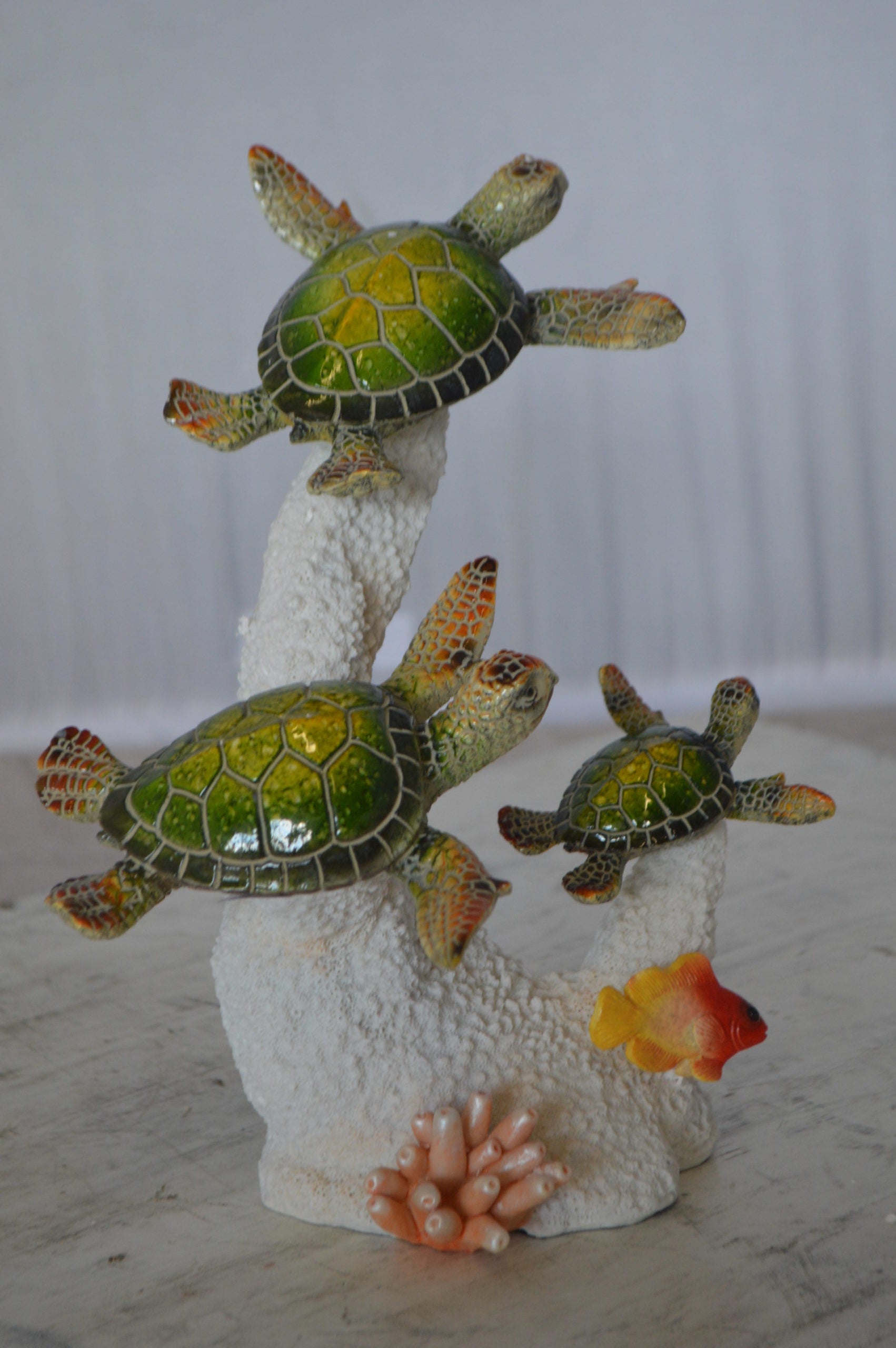 Three Turtles Swimming Resin Statue -  Size: 8"L x 8"W x 10"H. 
