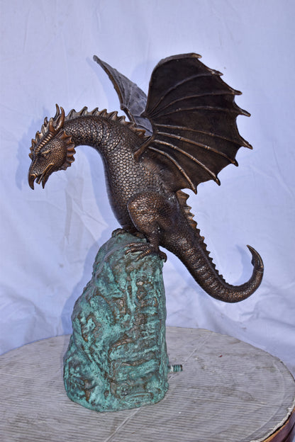 Dragon Standing on a Rock Bronze Statue Fountain - Size: 23"L x 18"W x 23"H.