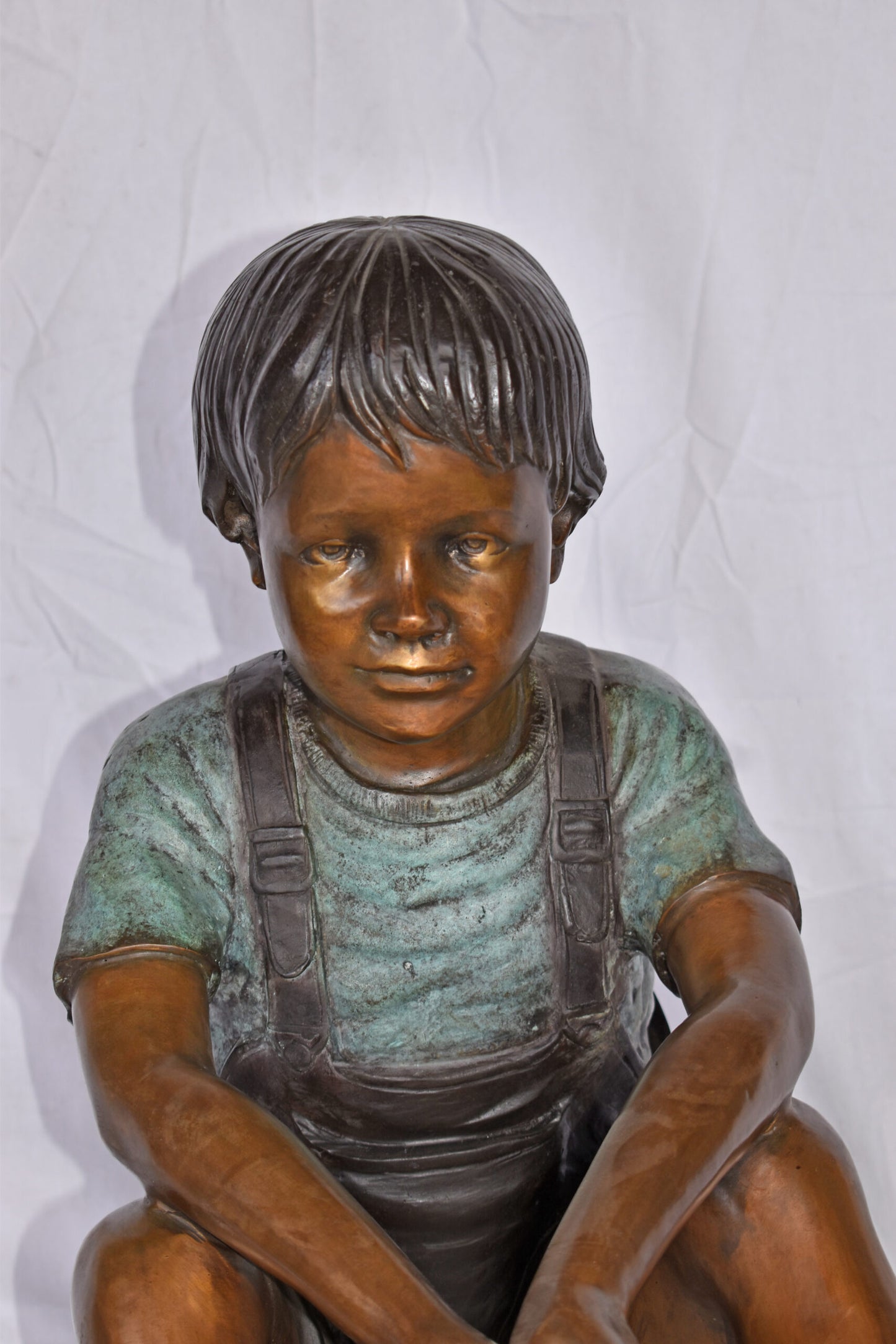 Boy Sitting on the Ground, Fishing Bronze Statue - Size: 26"L x 15"W x 25"H.