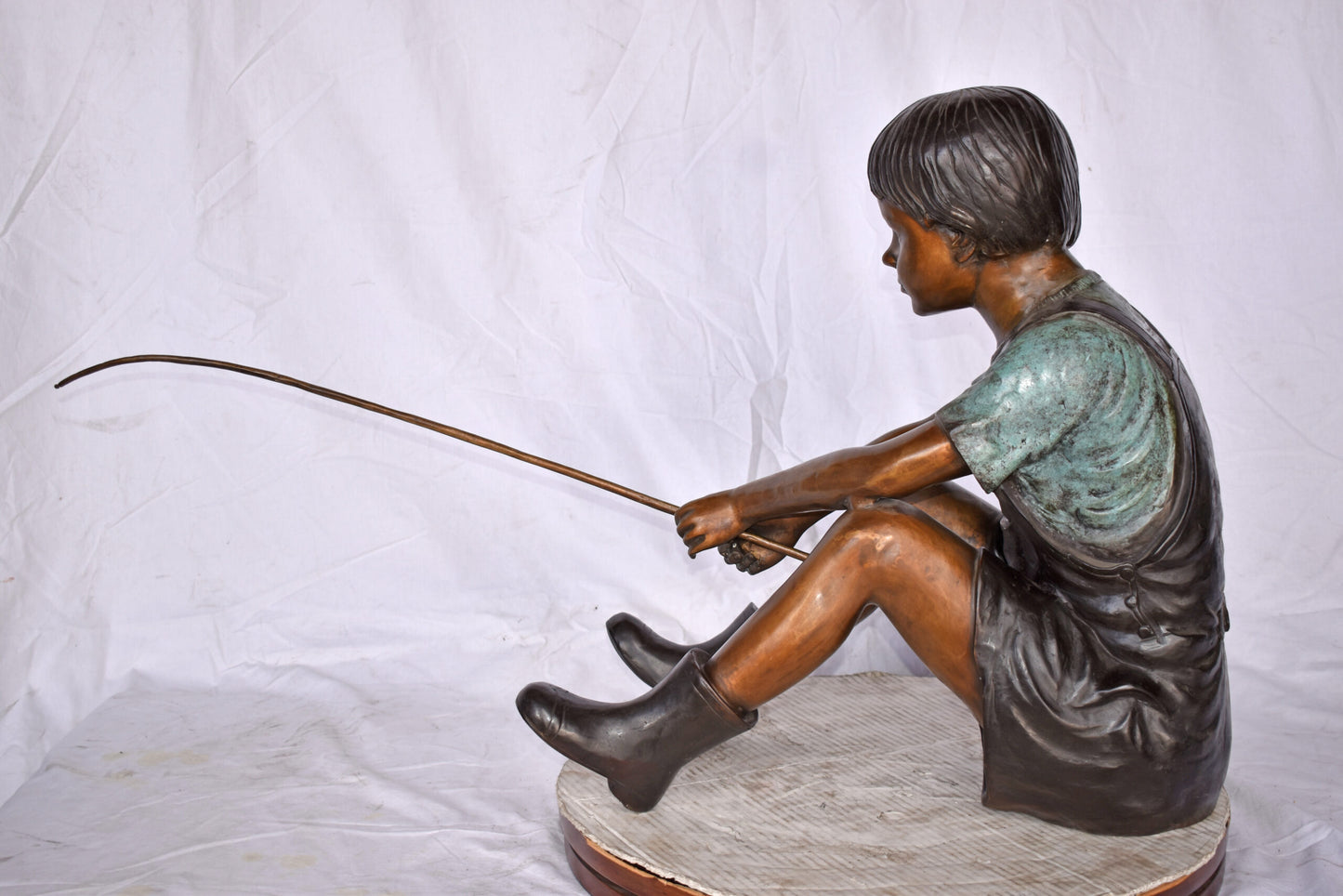 Boy Sitting on the Ground, Fishing Bronze Statue - Size: 26"L x 15"W x 25"H.