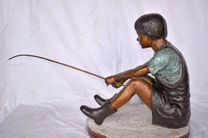 Boy Sitting on the Ground, Fishing Bronze Statue - Size: 26"L x 15"W x 25"H.