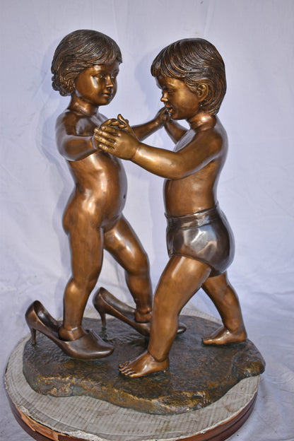 Girl with Big Shoes Dancing with A Boy Bronze Art Nude 21"L x 15"W x 30"H.