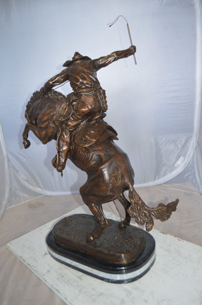 Jumbo Bronco Buster  by Remington Bronze Statue -  Size: 19"L x 11"W x 36"H. 