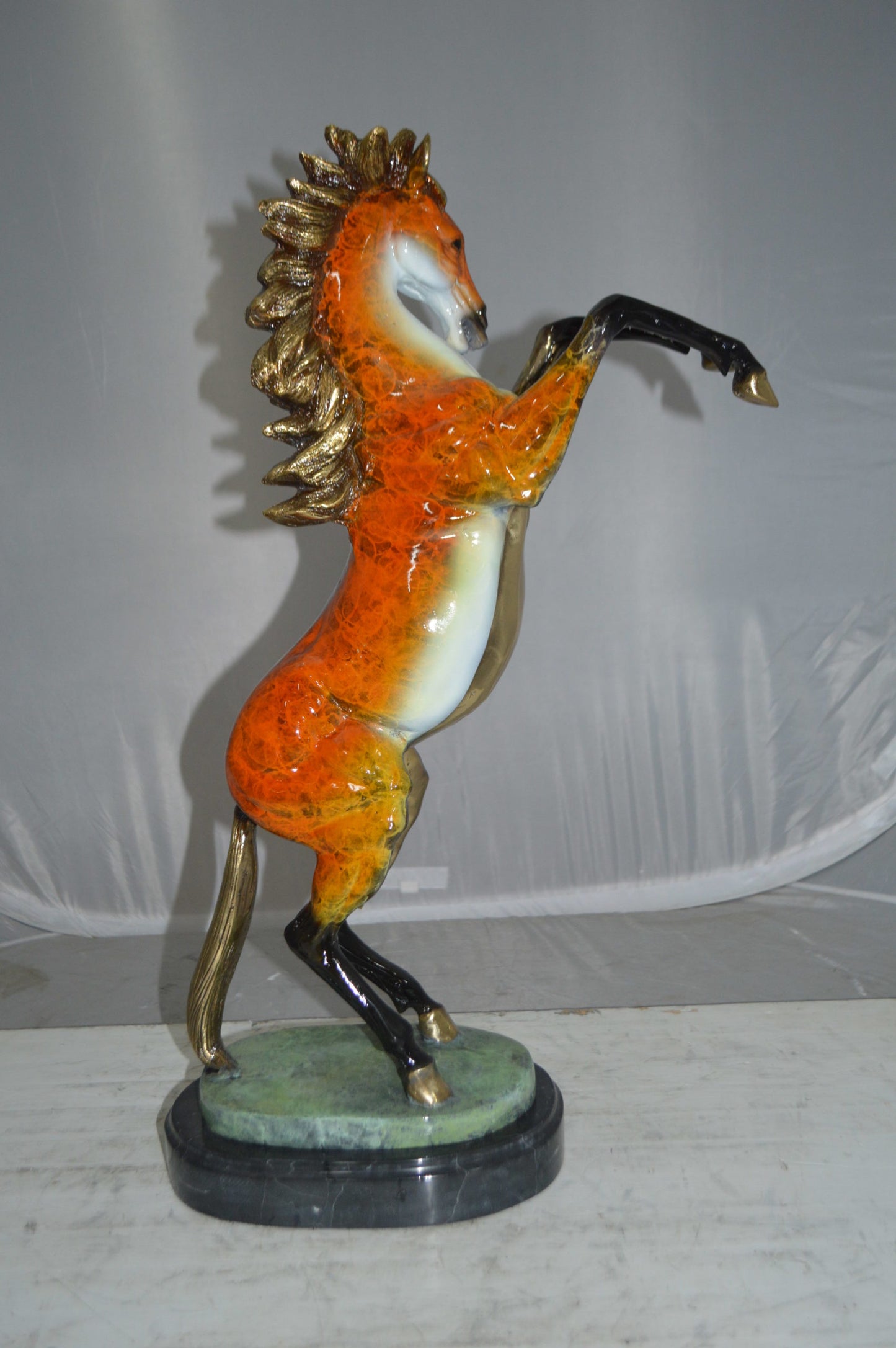 Horse on a Marble Base Bronze Statue - Size: 20"L x 8"W x 27"H.