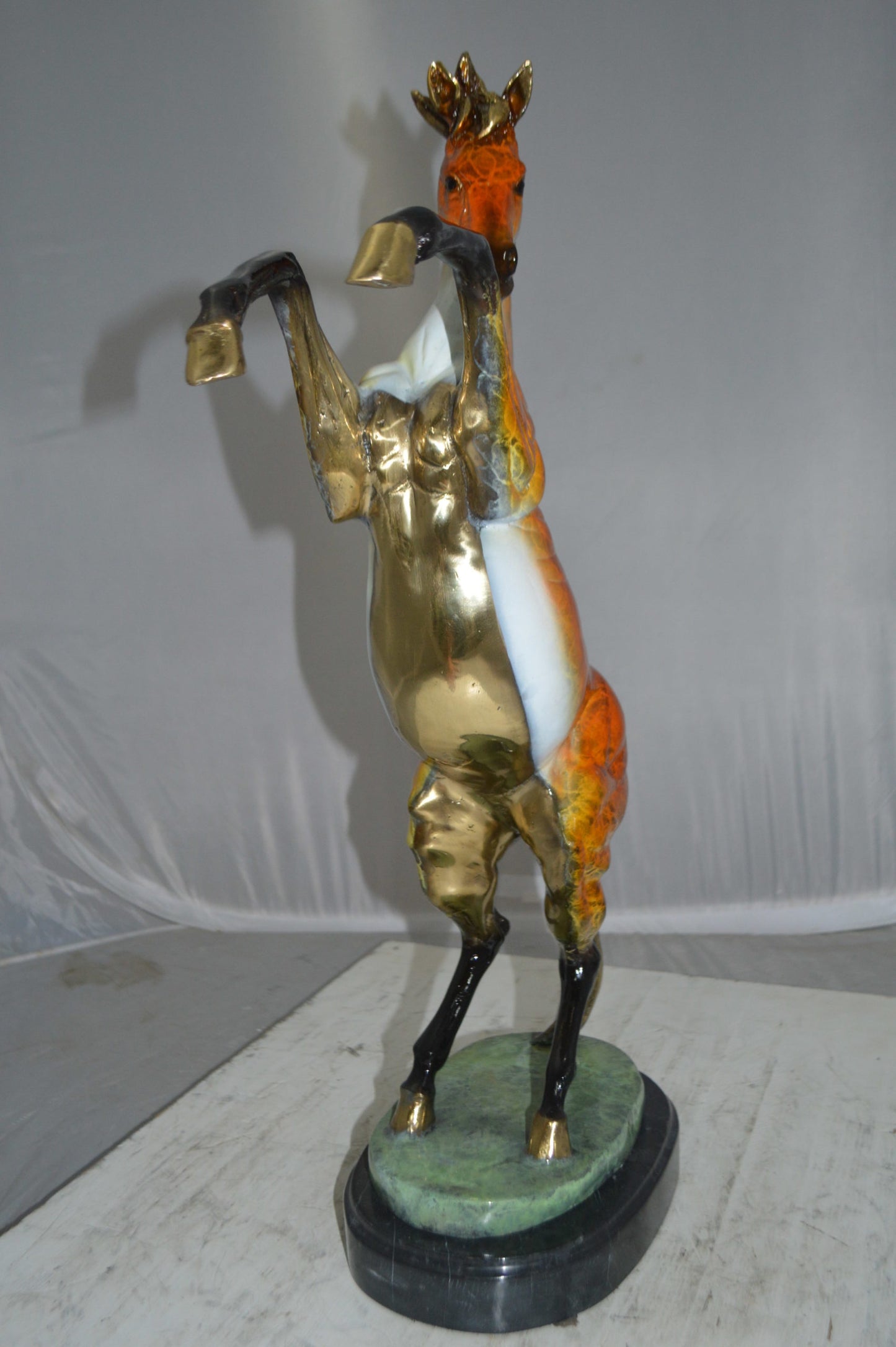 Horse on a Marble Base Bronze Statue - Size: 20"L x 8"W x 27"H.
