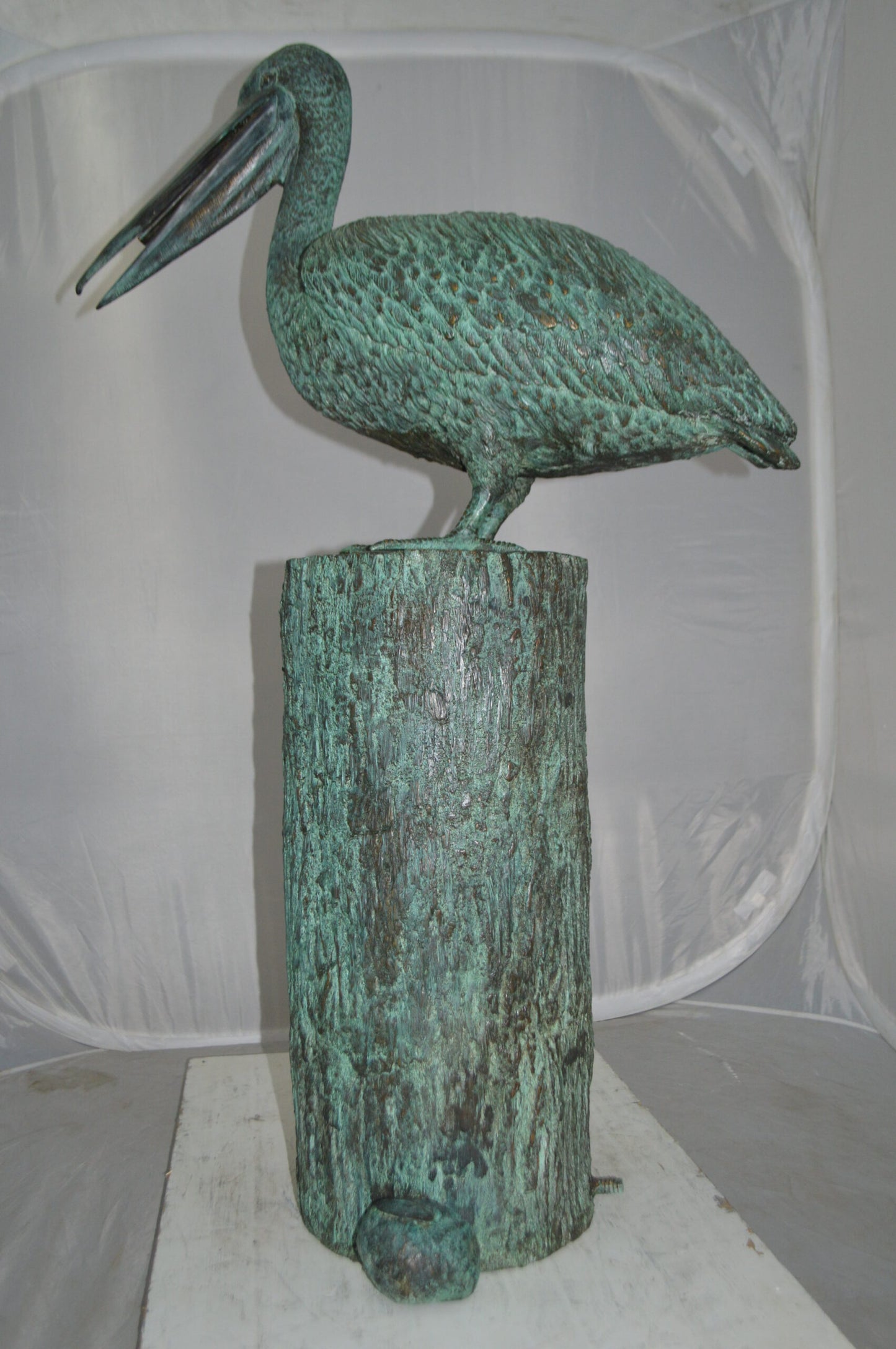 Standing Pelican Bronze Fountain - Size: 20"L x 30"W x 43"H.