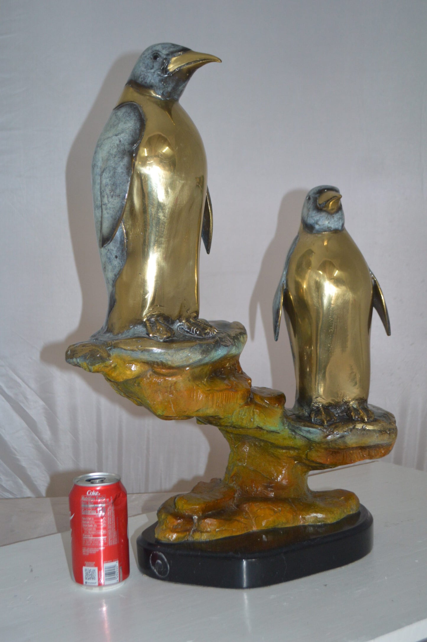 Two Penguins Bronze Statue -  Size: 16"L x 10"W x 12"H.