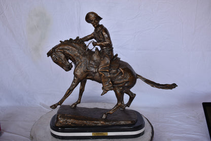 Remington Cowboy Replica Bronze Statue on Triple Marble - Size: 8"x 26"x 23"H.