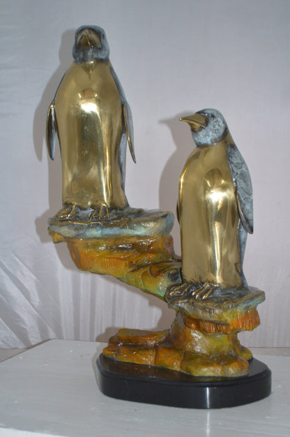 Two Penguins Bronze Statue -  Size: 16"L x 10"W x 12"H.