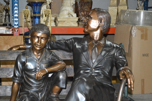 Grandfather an Grandson on a Bench Bronze Statue -  Size: 53"L x 32"W x 44"H.