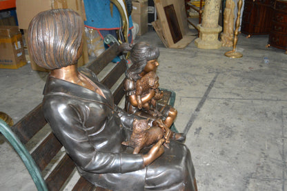 Grandmother and Granddaughter on bench statue -  Size: 53"L x 32"W x 44"H.