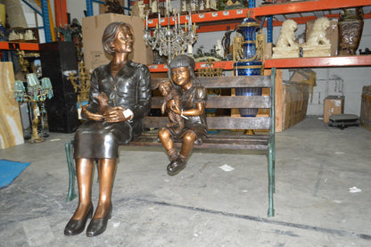 Grandmother and Granddaughter on bench statue -  Size: 53"L x 32"W x 44"H.