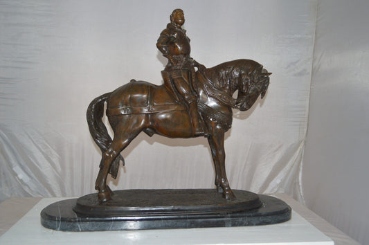 Man on his Horse Bronze Statue -  Size: 30"L x 10"W x 25"H.