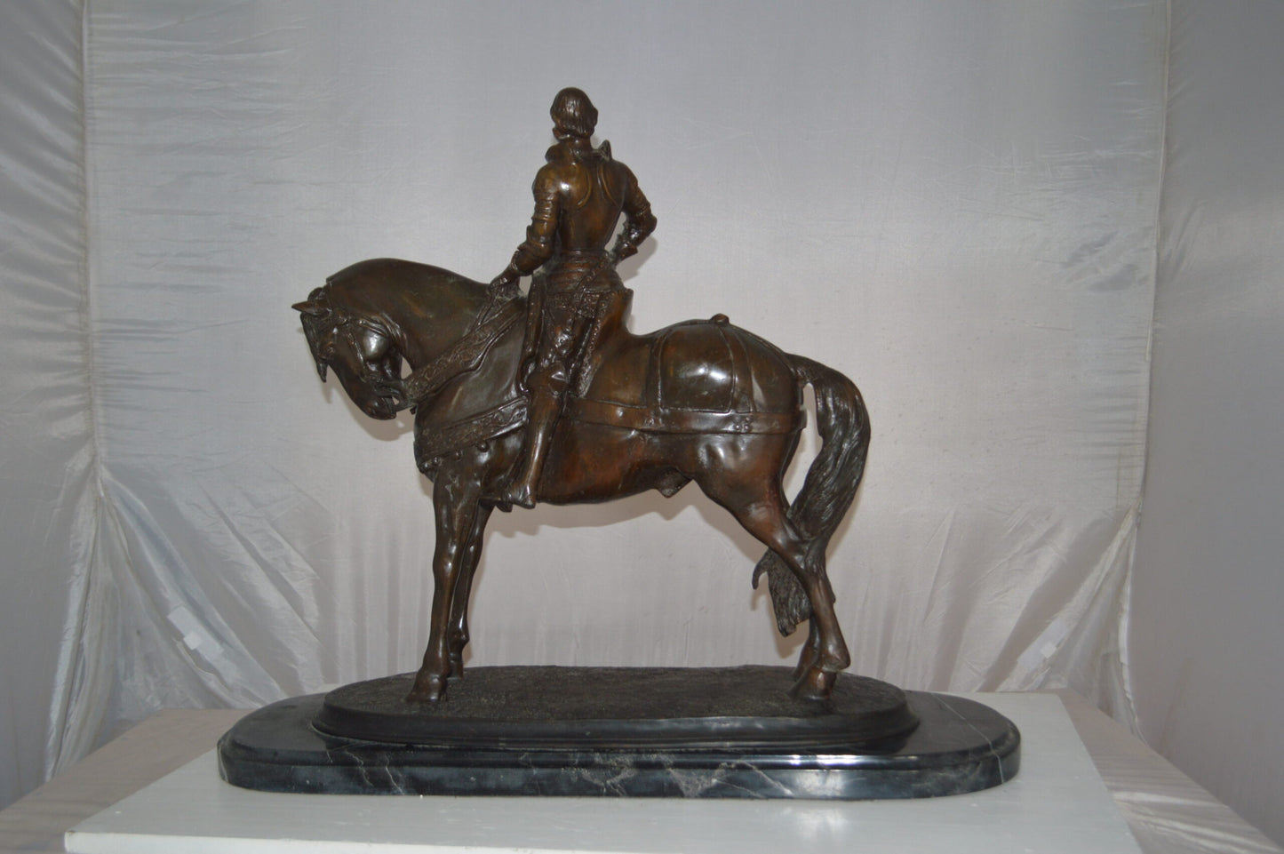 Man on his Horse Bronze Statue -  Size: 30"L x 10"W x 25"H.