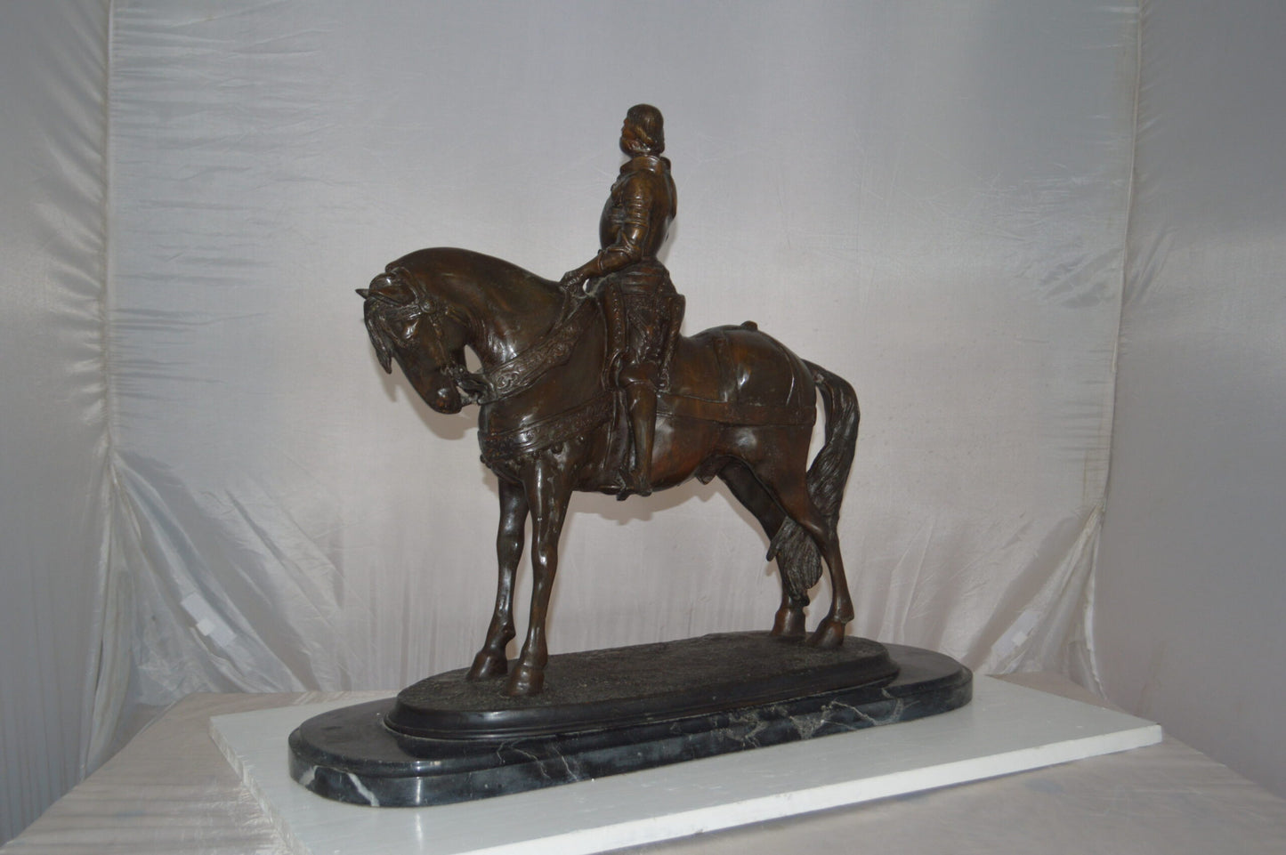 Man on his Horse Bronze Statue -  Size: 30"L x 10"W x 25"H.