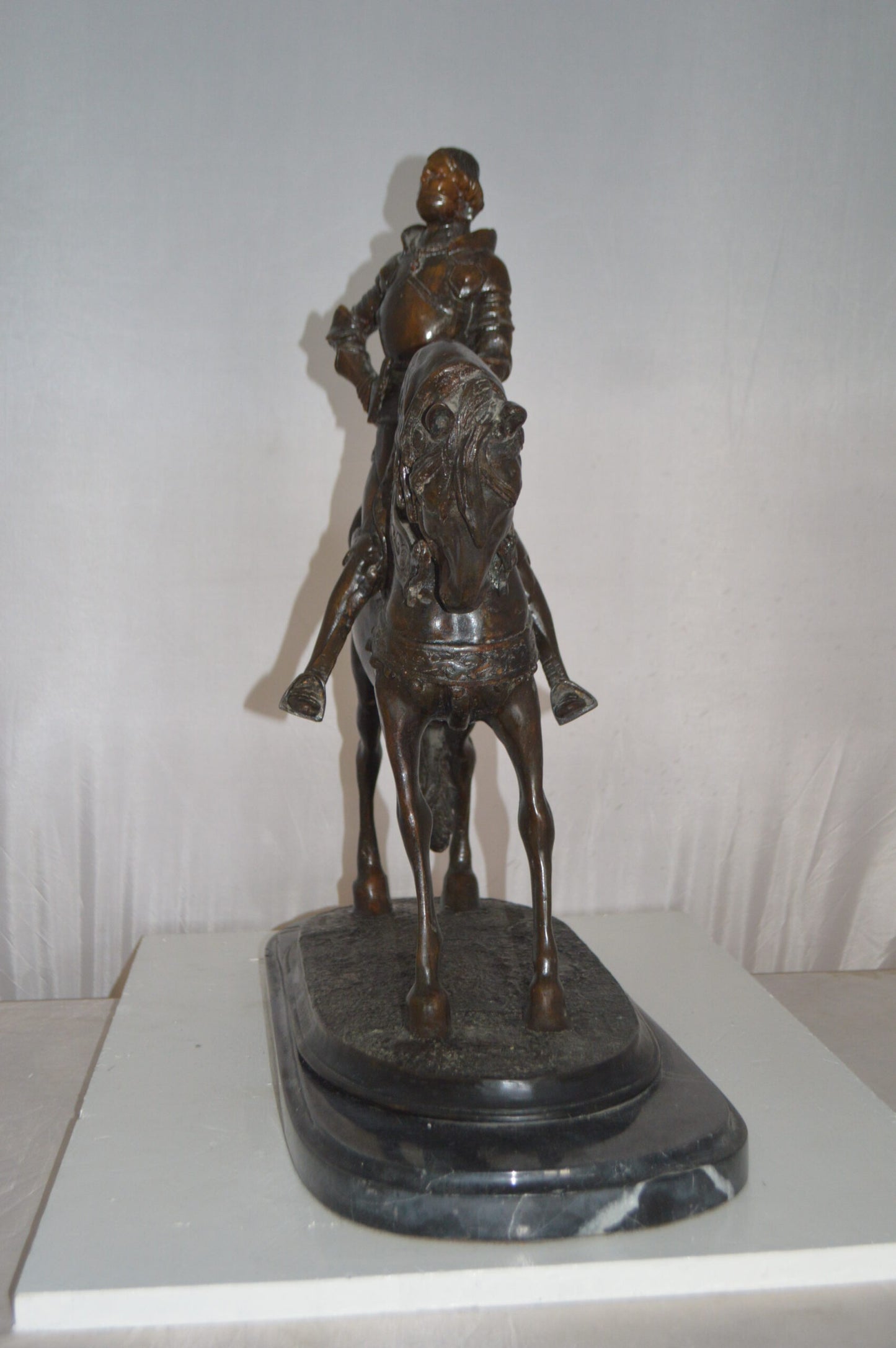 Man on his Horse Bronze Statue -  Size: 30"L x 10"W x 25"H.