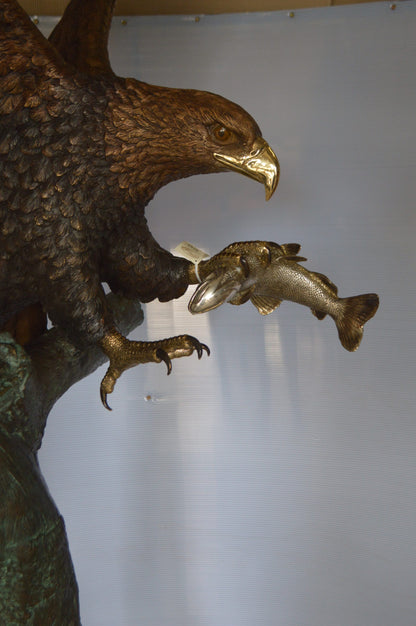 Landing Eagle on a Tree Giant Bronze Statue -  Size: 72"L x 36"W x 88"H.