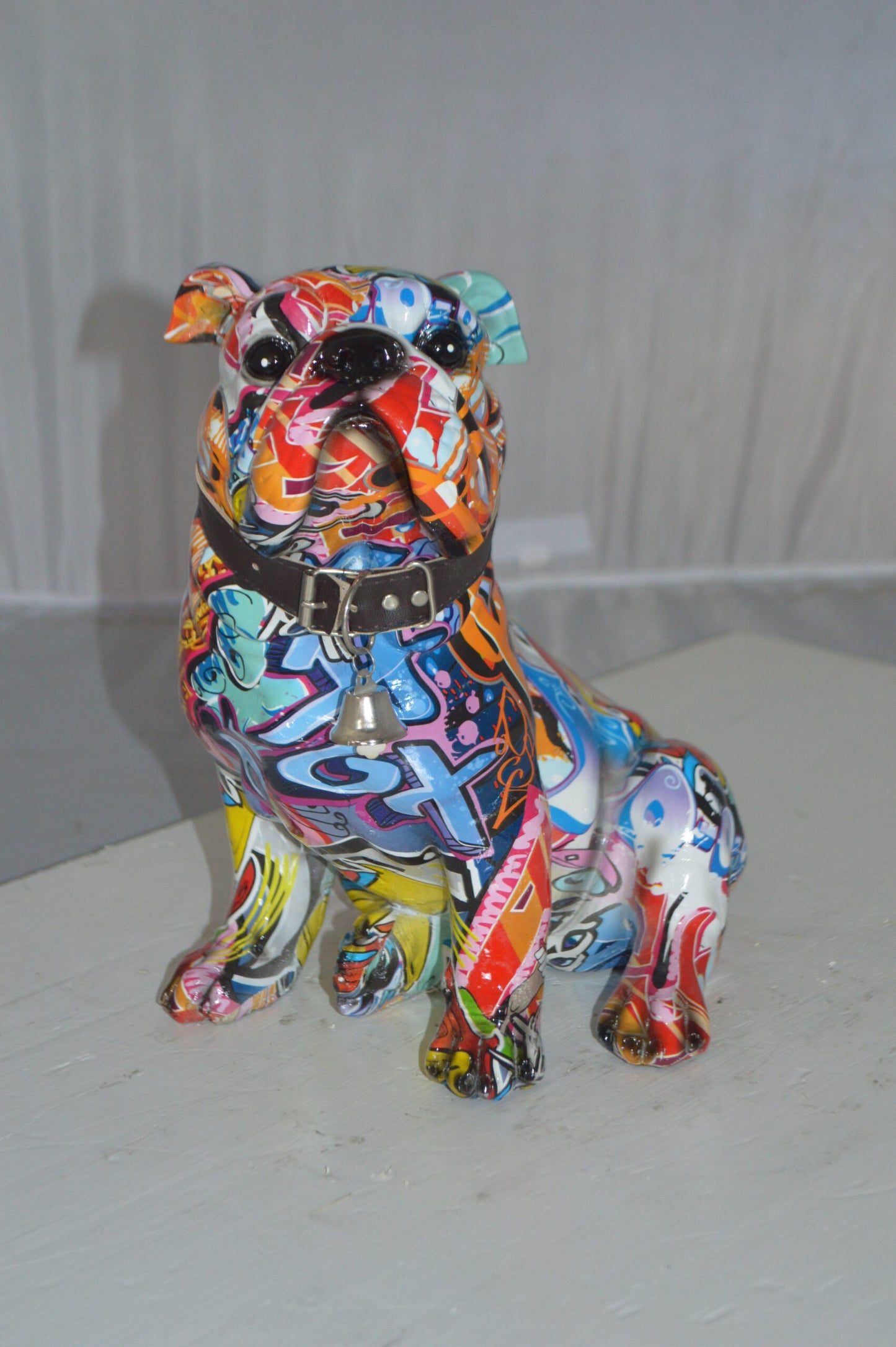 Modern Tie Dye Bulldog made of Resin -  Size: 9"L x 8"W x 12"H.