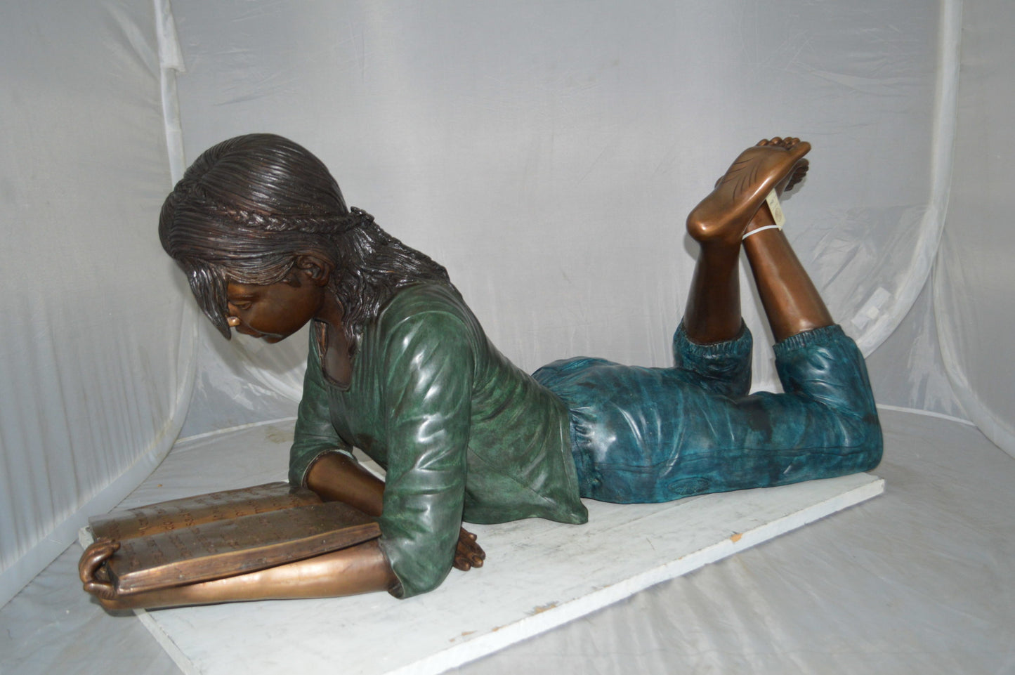 Kate Reading a Book Bronze Statue -  Size: 42"L x 18"W x 17"H.