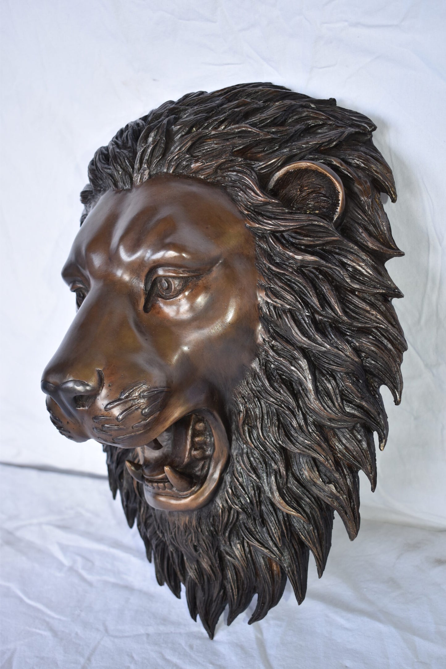 Wall Mounted Lion Face Fountain Made of Bronze - Size: 12"L x 8"W x 18"H.