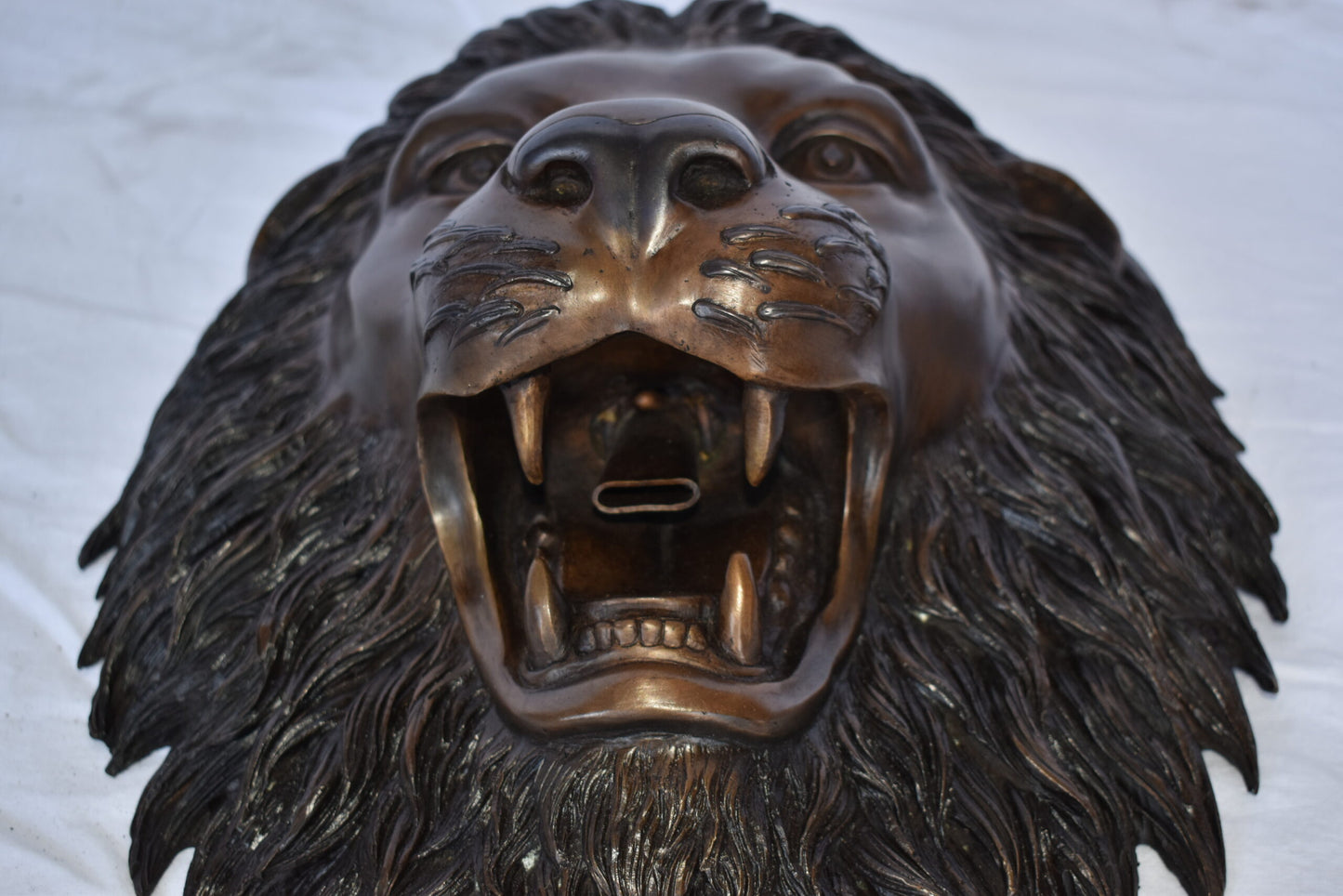 Wall Mounted Lion Face Fountain Made of Bronze - Size: 12"L x 8"W x 18"H.