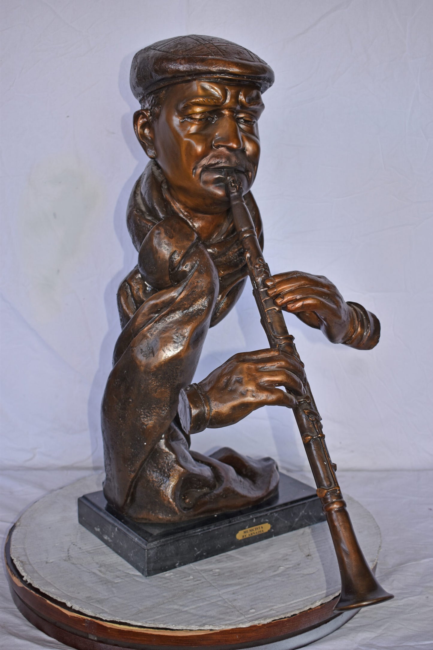 Musicista By Arnadia, Bust of Clarinet Player Bronze Statue -  17" x 25" x 31"H.
