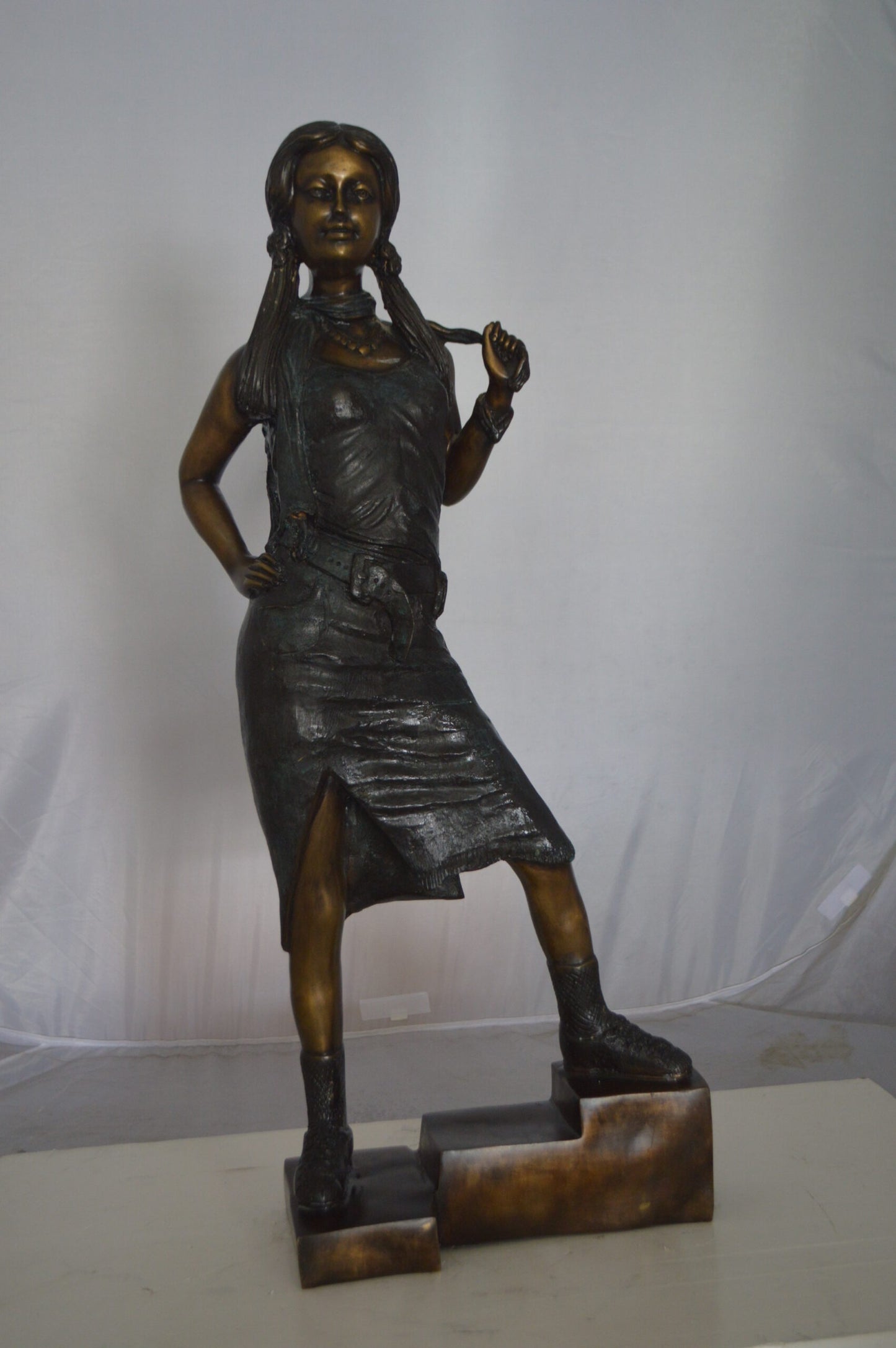Girl Posing on Steps Bronze Statue -  Size: 7"L x 12"W x 33"H.