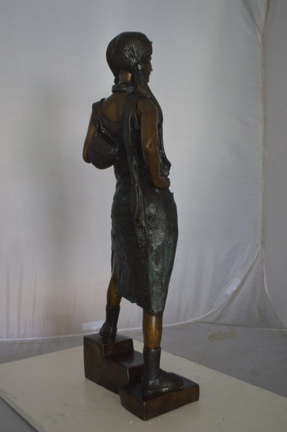 Girl Posing on Steps Bronze Statue -  Size: 7"L x 12"W x 33"H.