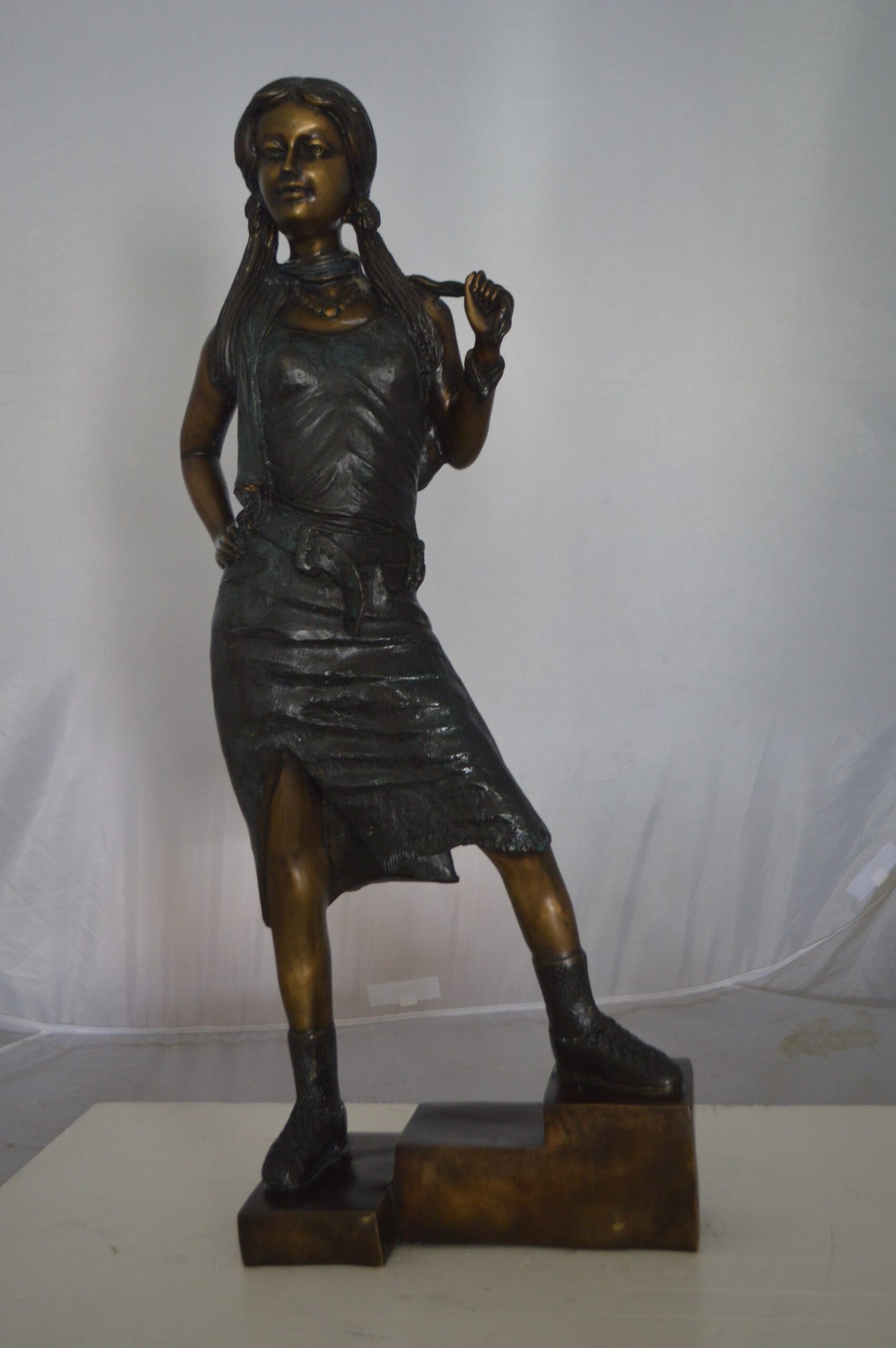 Girl Posing on Steps Bronze Statue -  Size: 7"L x 12"W x 33"H.