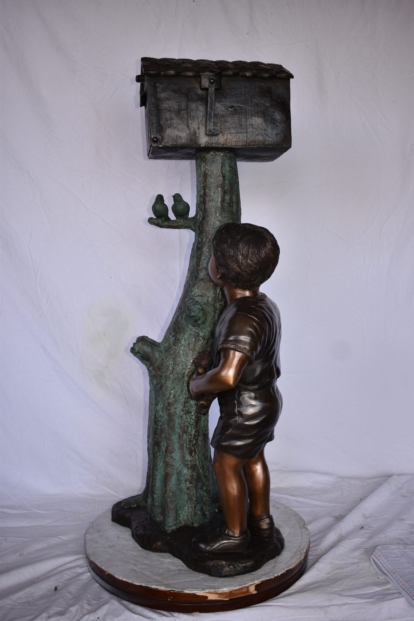 A Boy Standing by His Mailbox Looking at Birds Bronze Statue  25" x 22" x 51"H.