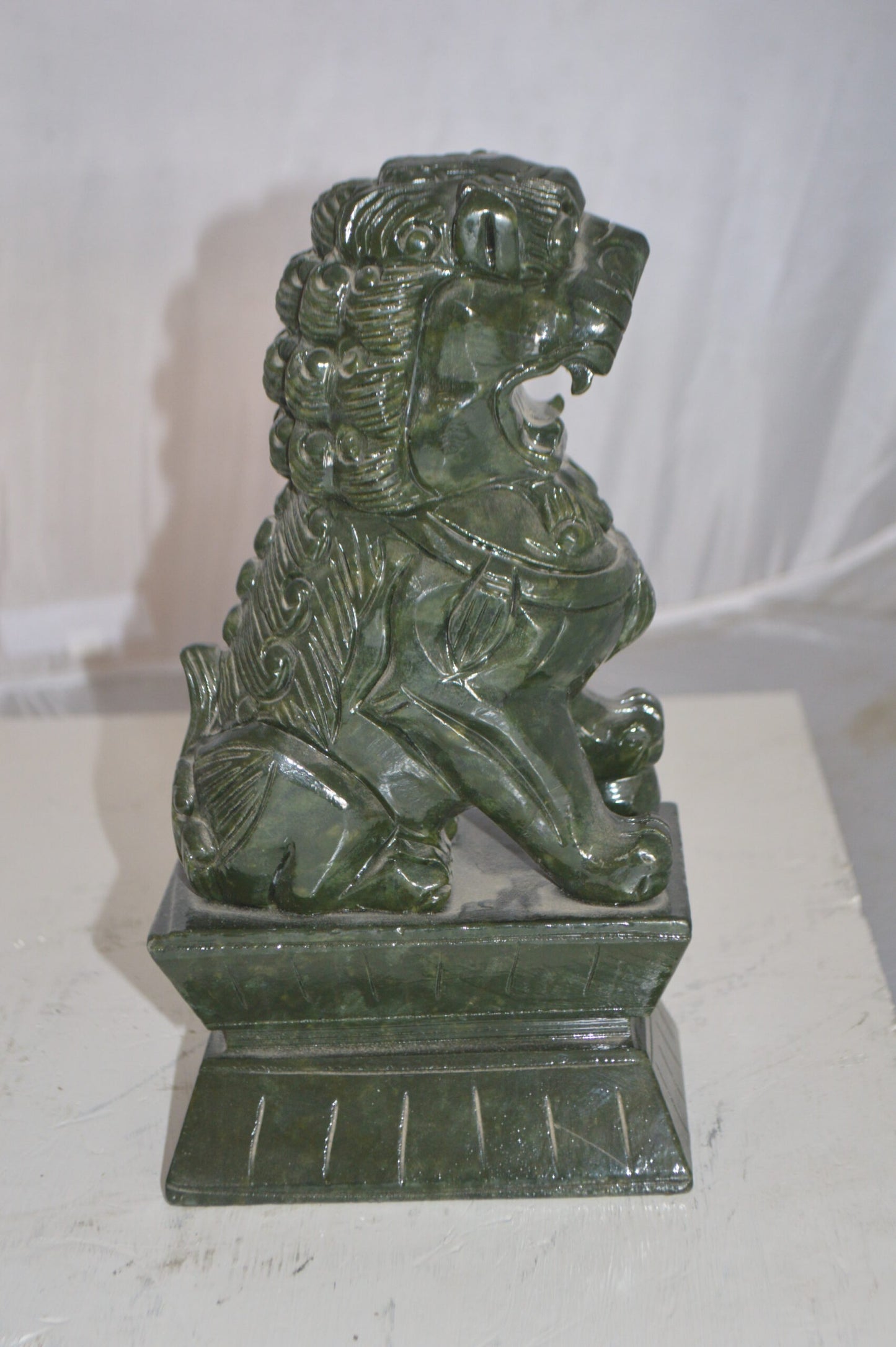 Pair of Foo Dogs Made of Jade -  Size: 7"L x 4"W x 14"H.