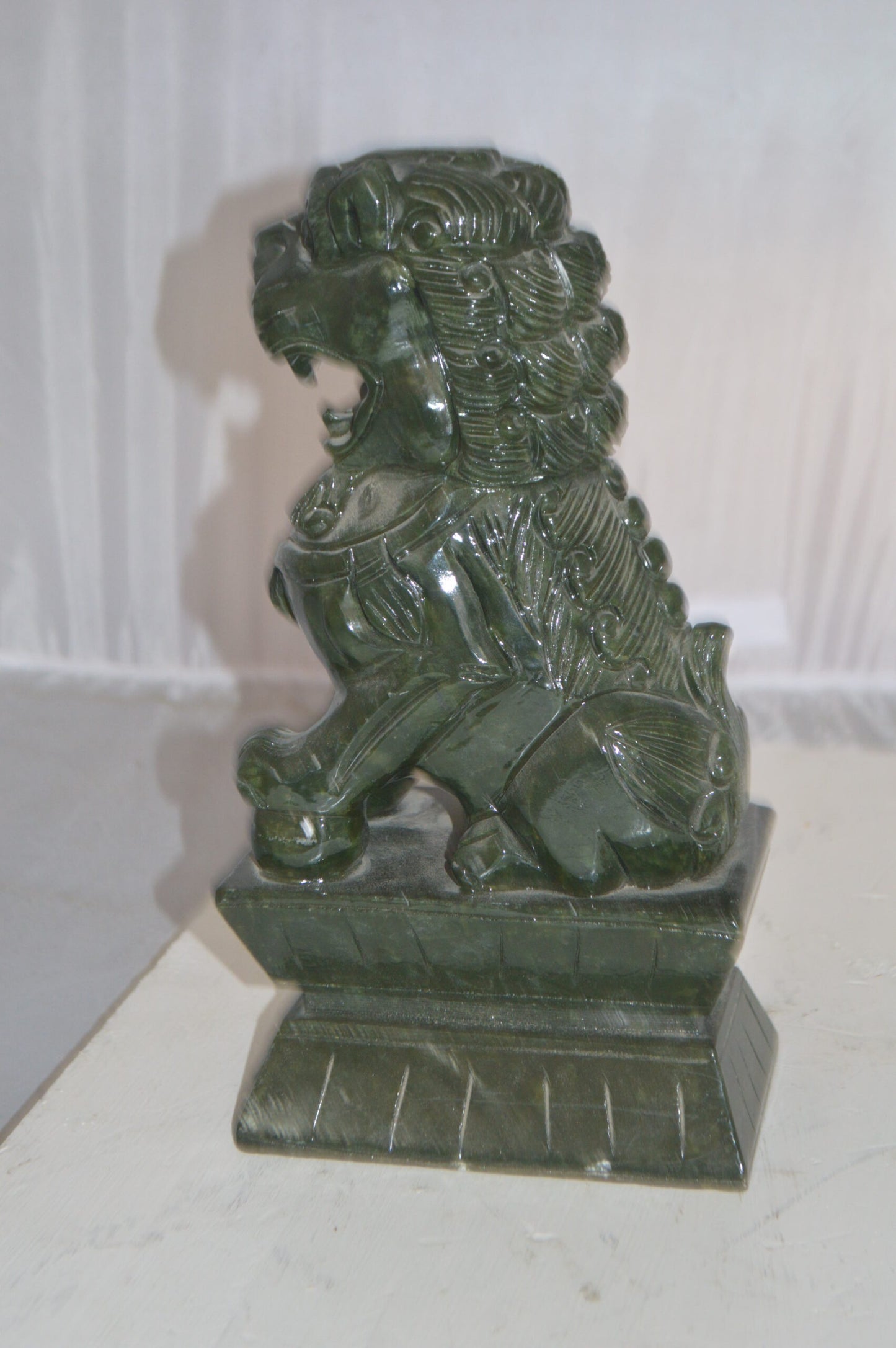 Pair of Foo Dogs Made of Jade -  Size: 7"L x 4"W x 14"H.