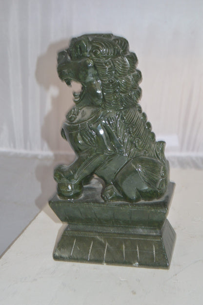 Pair of Foo Dogs Made of Jade -  Size: 7"L x 4"W x 14"H.