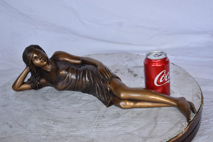 Gorgeous Young Lady Laying on The Ground Bronze Statue - Size: 5"L x 21"W x 5"H.