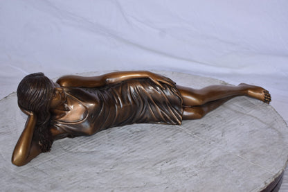 Gorgeous Young Lady Laying on The Ground Bronze Statue - Size: 5"L x 21"W x 5"H.