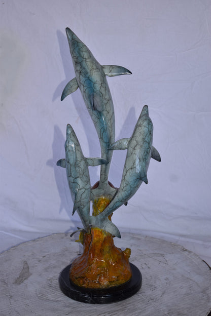 Three Dolphins Jumping Next to A Sea Turtle Bronze Statue  10"x 11" x 24"H.