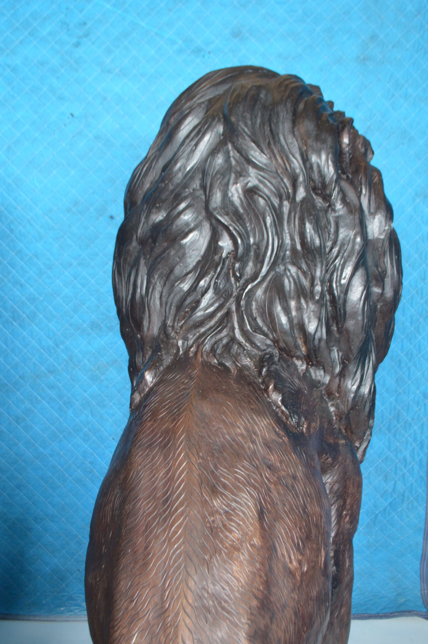 Pair of life size lion bronze statues -  Size: 55"L x 28"W x 60"H.