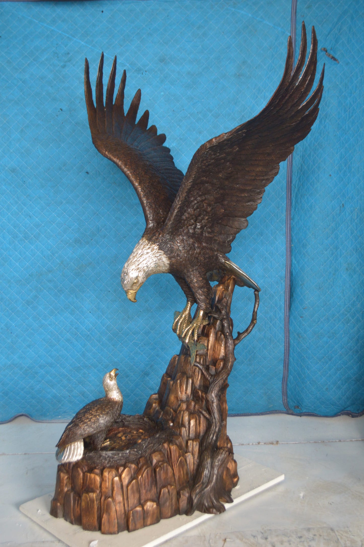 Eagle with nest Bronze Statue -  Size: 36"L x 40"W x 63"H.