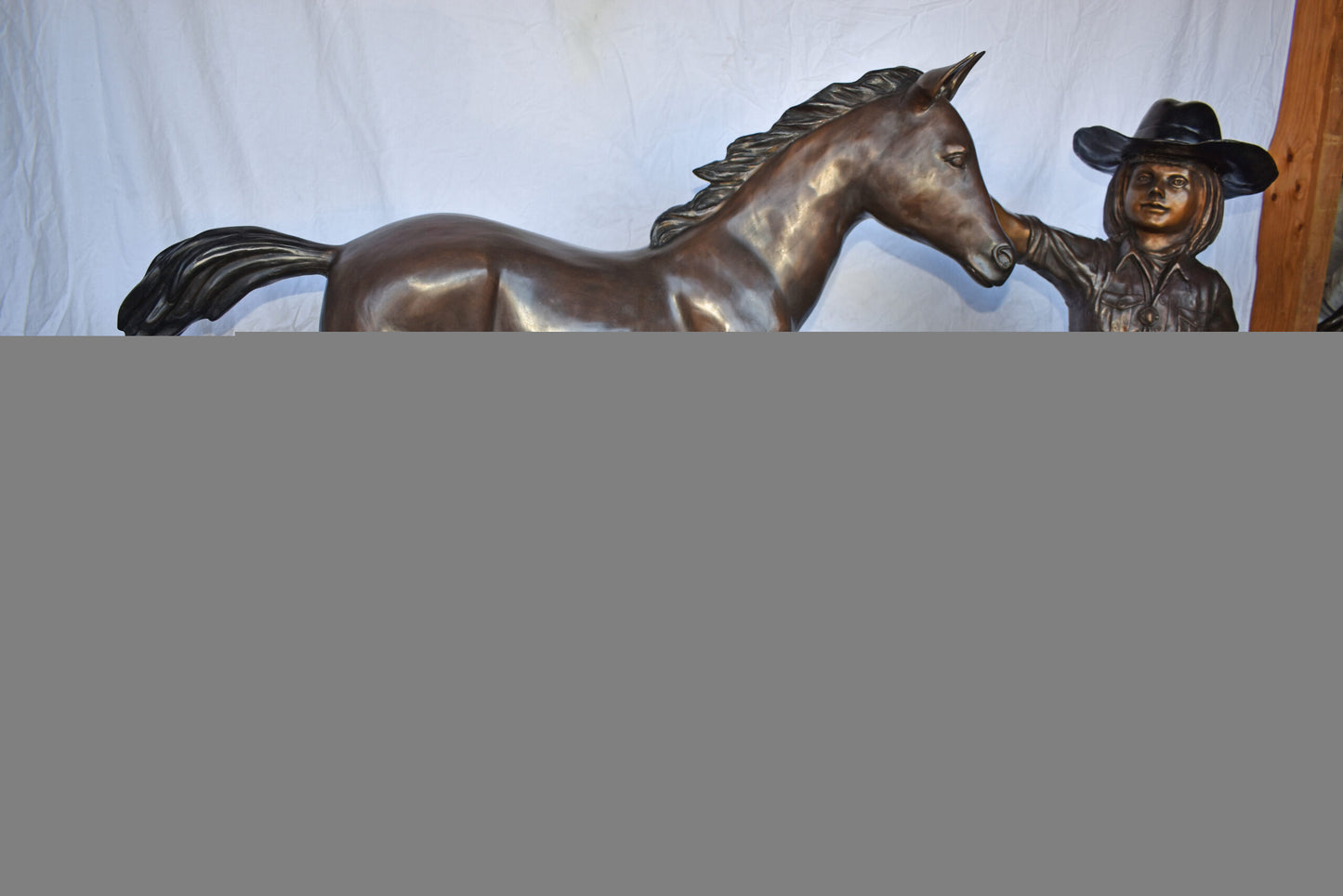 A Young Cowgirl with A Young Horse Bronze Statue Size: 60" x 30" x 44"H