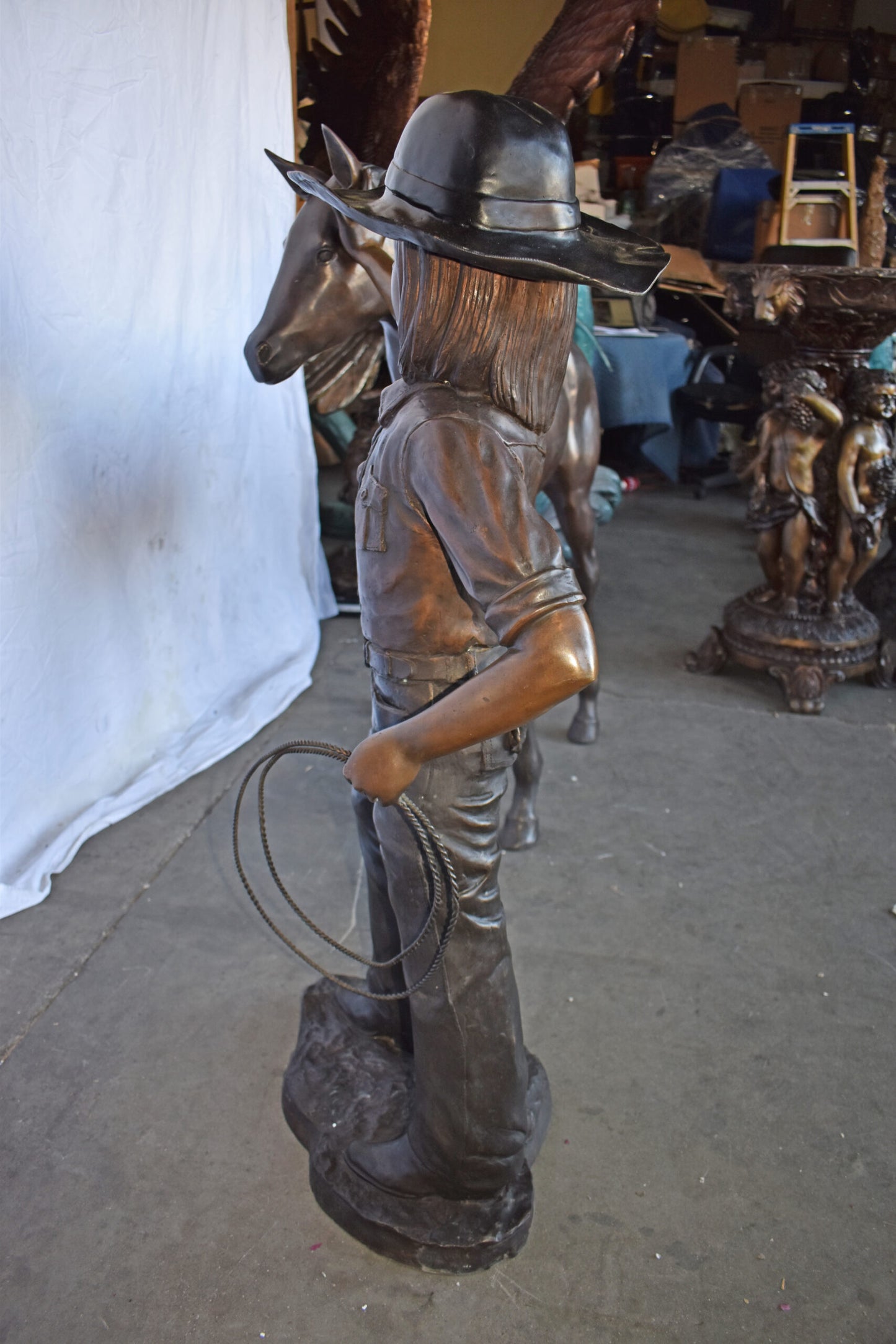 A Young Cowgirl with A Young Horse Bronze Statue Size: 60" x 30" x 44"H